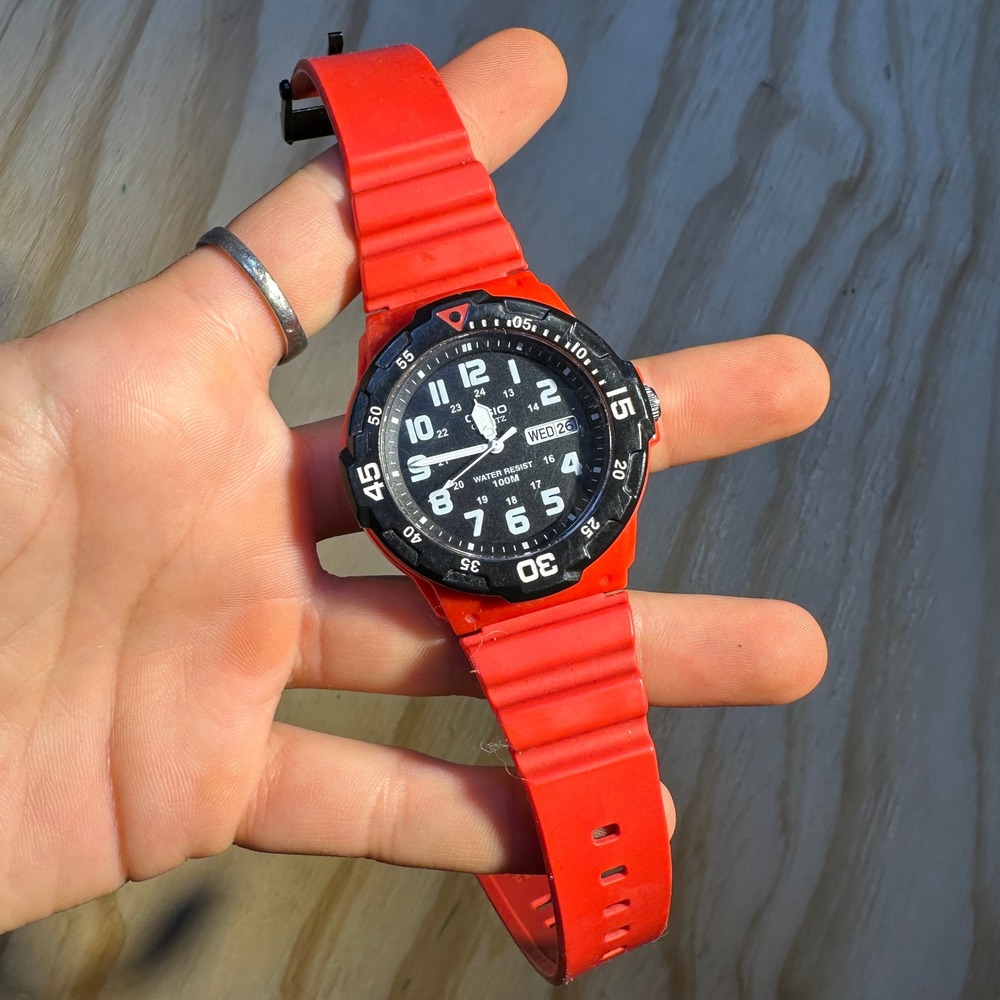 Casio MRW-200H Red Resin Sport Watch Mens Black Dial 100M Water Resistant